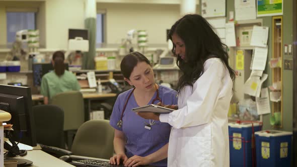 Nurse and Doctor modern collaboration in hospital. alt