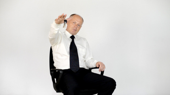 Relax Businessman Holding Keys Relax Businessman Holding Keys
