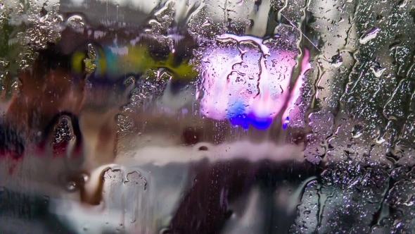 Rain Drops Flowing On Car Glass Rain Drops Flowing On Car Glass
