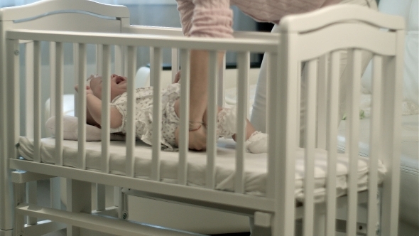 Sleepy Baby In The Crib Sleepy Baby In The Crib