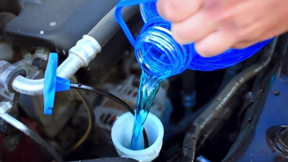 Filling Windshield Washer Fluid Filling Windshield Washer Fluid