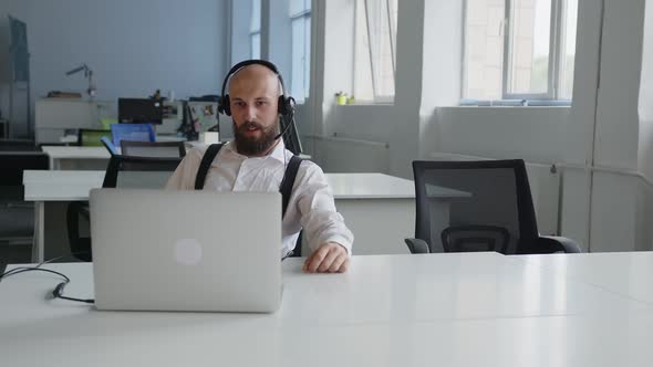 Businessman Making Conference Video Call on Laptop alt