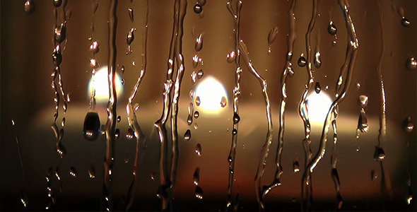Candles and Rain Drops on Window
