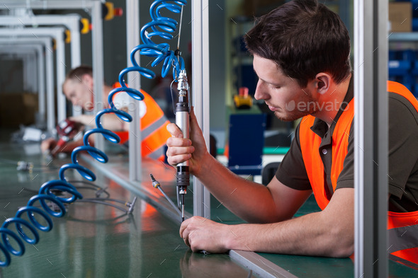 Factory workers and production process - Stock Photo - Images