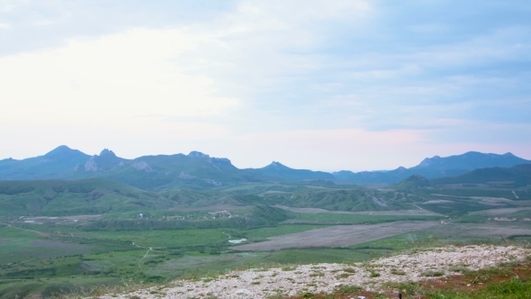 Mountain Biker Exploring Hilly Terrain Mountain Biker Exploring Hilly Terrain