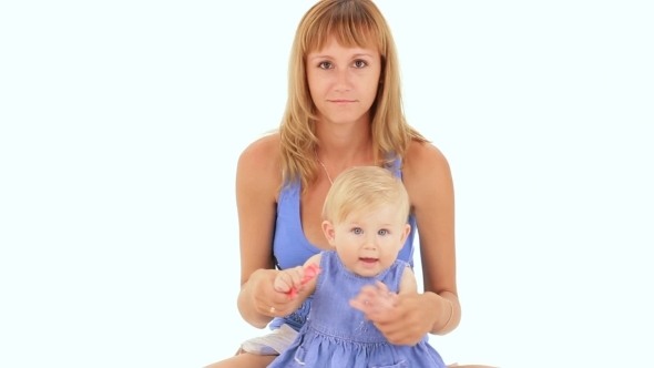Mom And Daughter On A White Background Mom And Daughter On A White Background