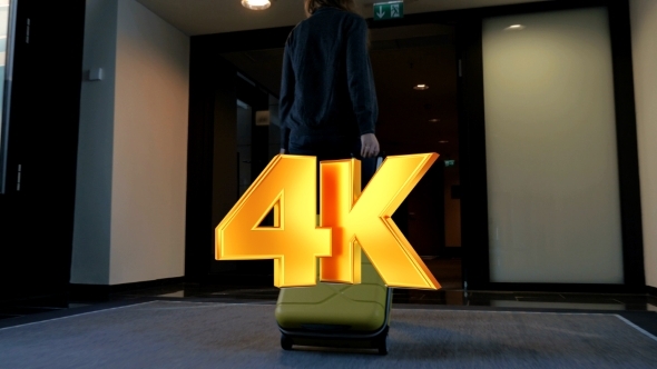 Woman With Travel Bag Walking To Her Hotel Room Woman With Travel Bag Walking To Her Hotel Room