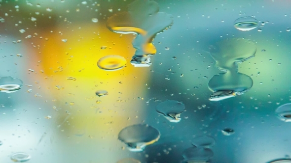 Drops Of Rain Flowing On Window During Rain 