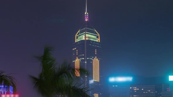 Close Up View of the Futuristic Skyscrapers Timelapse and Their Blinking Lights on Kowloon alt