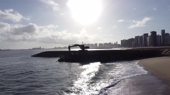 Silhueta de Tratos à beira mar em Fortaleza alt
