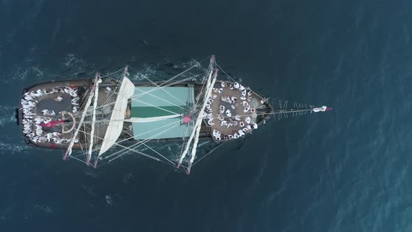 Happy People Celebrating Wedding Event on Deck Large Old Historic Medieval Ship alt