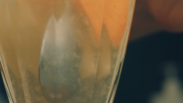 The Pulp Of Lemon Floating In The Glass The Pulp Of Lemon Floating In The Glass