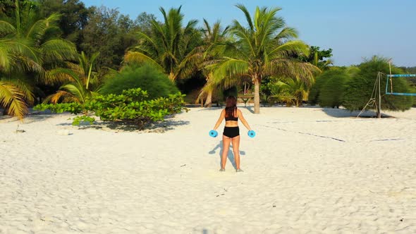 Beautiful ladies happy and smiling on marine tourist beach wildlife by clear water and white sand ba alt