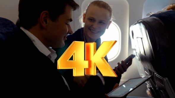 Young People Making Agreement In The Plane Young People Making Agreement In The Plane