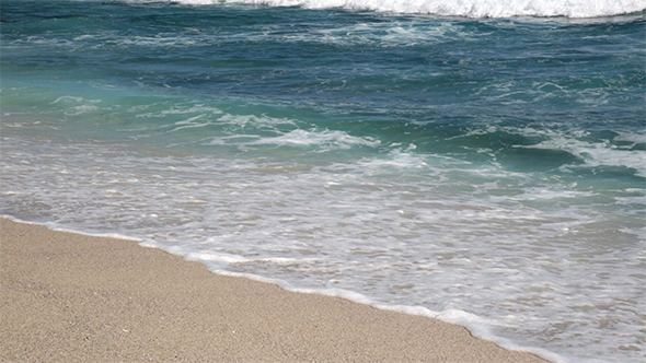 Waves on the Beach Sand