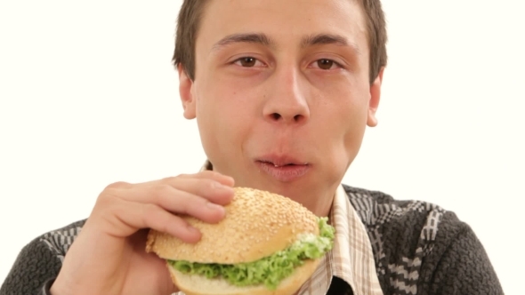 Man Eating Hamburger