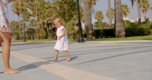 Small Girl Chasing Air Bubbles Small Girl Chasing Air Bubbles