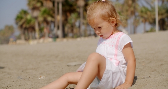 Cute Young Girl Playing On Sandy Tropical Beach Cute Young Girl Playing On Sandy Tropical Beach