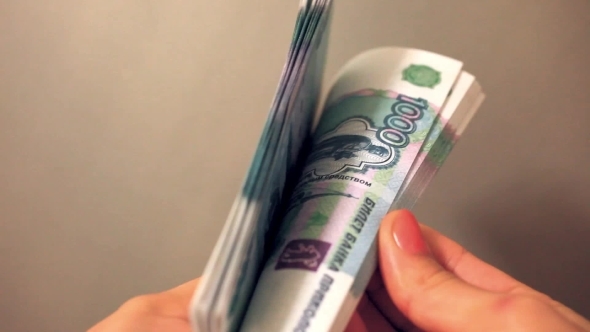 Women Hands Counting Russian Banknotes