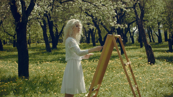Artist Paints In The Garden