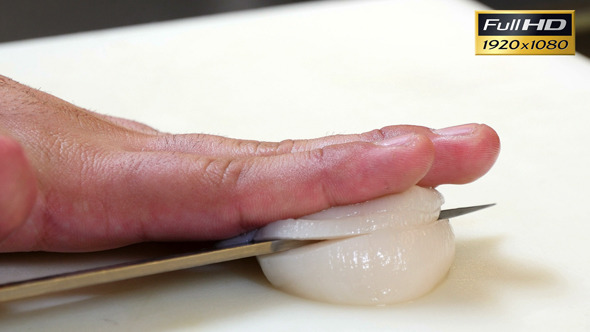 Sushi Chef Cutting a Scallop Sashimi Style alt