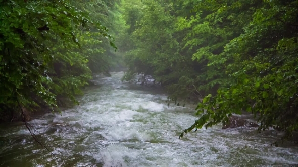 Fast Mountain River Flowing Downhill Among
