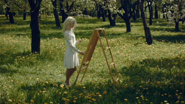 Artist Paints In The Garden