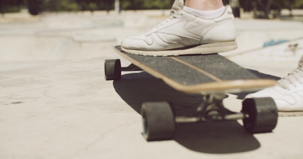 Man Standing With One Foot On a Skateboard, Stock Footage | VideoHive