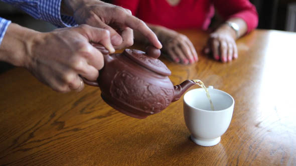 Man Pours Tea Man Pours Tea