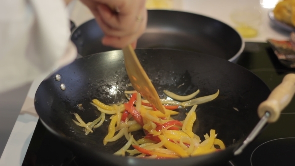 Chef Prepares Vegetables In a Frying Pan