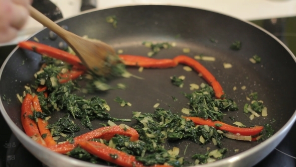 Chef Prepares Vegetables In a Frying Pan