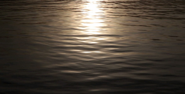 Sunlight Reflections on Water Surface