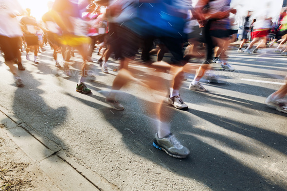 Marathon runners in motion. Running - Stock Photo - Images
