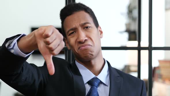 Thumbs Down by Black Businessman alt