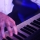 Hands Of Musician Playing Keyboard In Concert - VideoHive Item for Sale