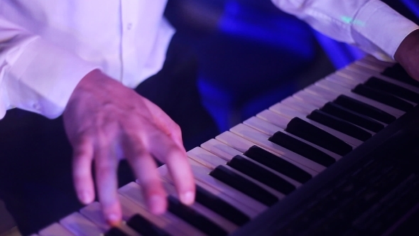 Hands Of Musician Playing Keyboard In Concert Hands Of Musician Playing Keyboard In Concert