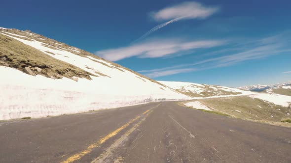 POV point of view -  Driving on alpine road of Mount Evans in Early Summer. alt