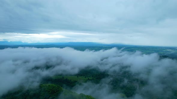 4K Aerial Drone shot flying over beautiful mountain ridge in rural jungle bush forest. alt
