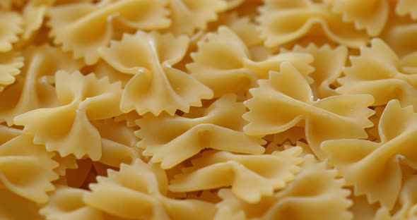 Dry uncooked farfalle alt