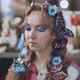 The Hairdresser Decorates the Model&#39;s Hair with Blue Flowers and Butterflies - VideoHive Item for Sale