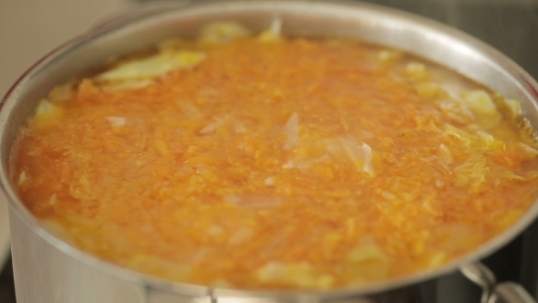 Cooking Pots And Stirring The Mixture alt