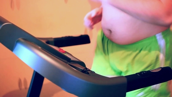 Overweight Man On The Treadmill 