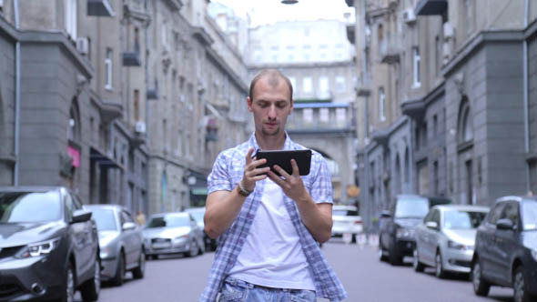 Man Uses Touch Panel Trips Man Uses Touch Panel Trips