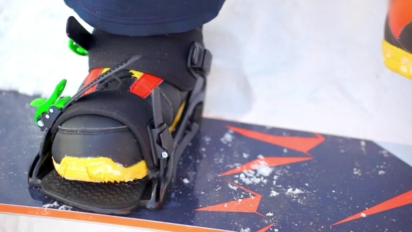 Men's Hands Are Fixed To The Board Snowboard Boots