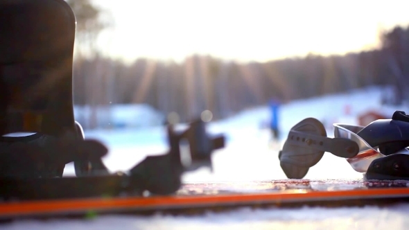 Snowboard Against a Blurred Background Mountains