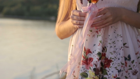 Girl With Flovers On Nature