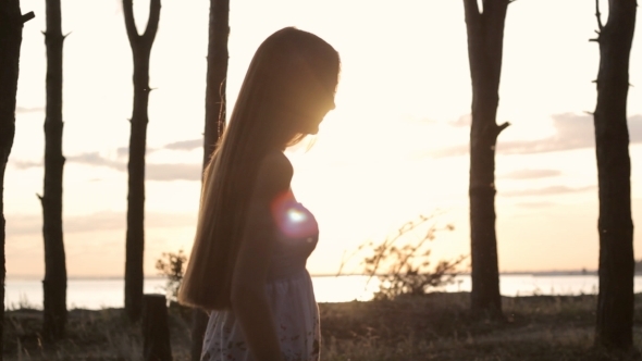 Girl Goes In Forest On Sun