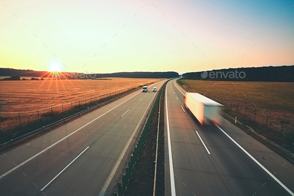 Highway at the sunrise - Stock Photo - Images