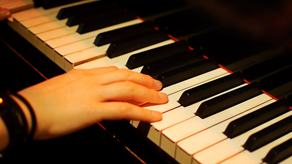 Woman Pianist Hands Plays The Grand Piano