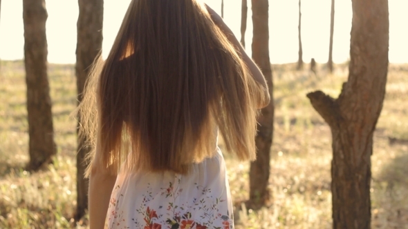 Girl Goes In Forest On Sun